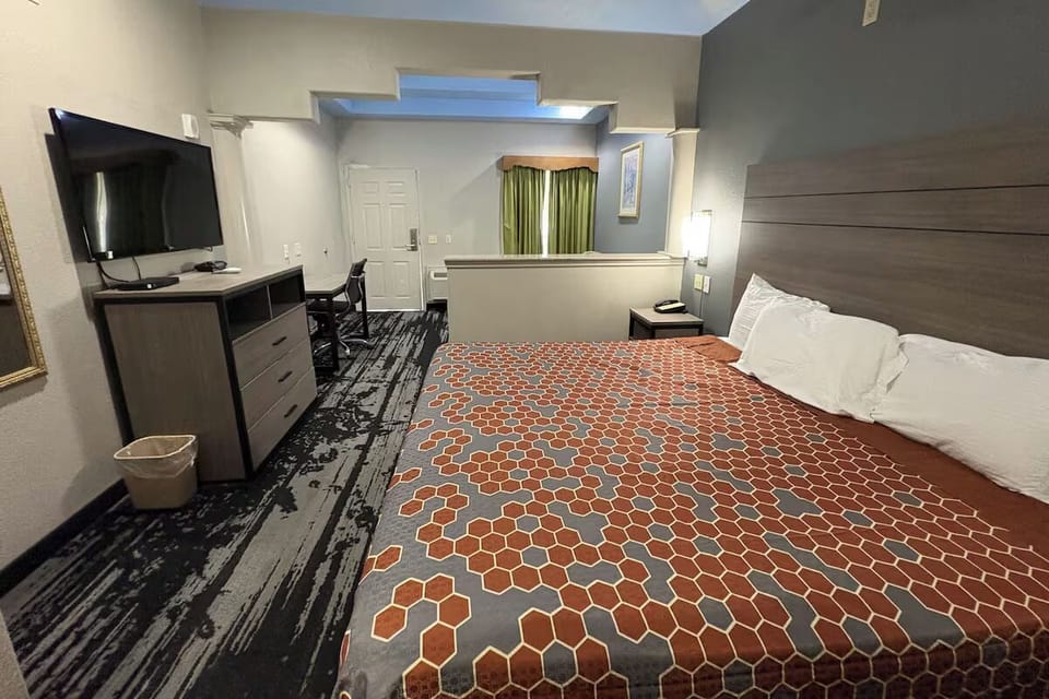 Stretch out on the king bed and relax with TV time.