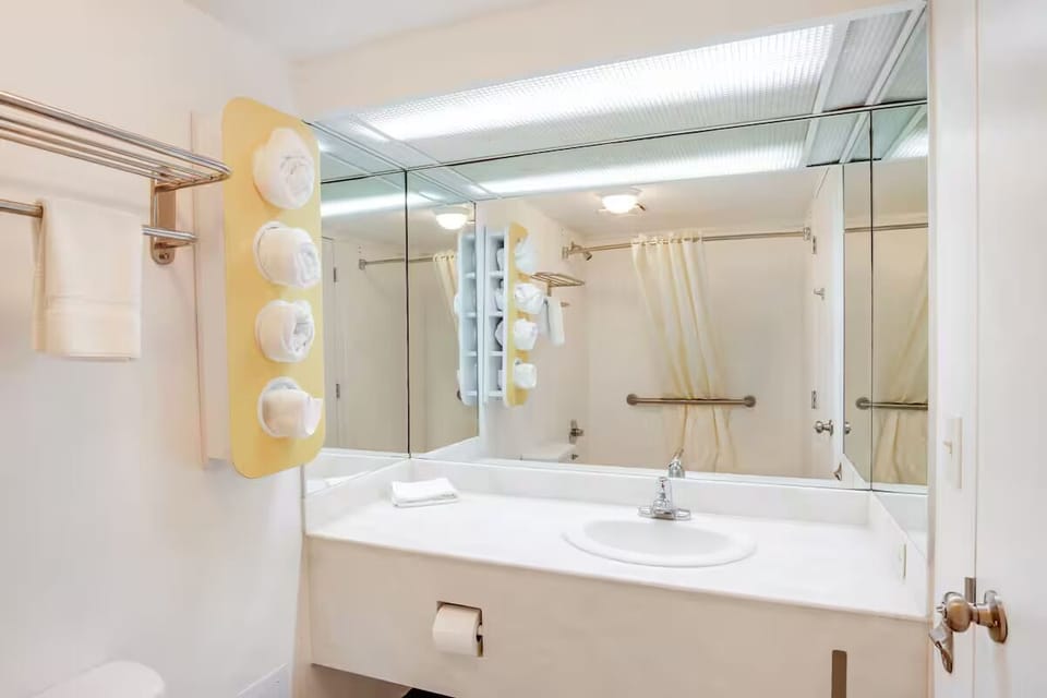 Start your day refreshed with a spacious vanity and shower.