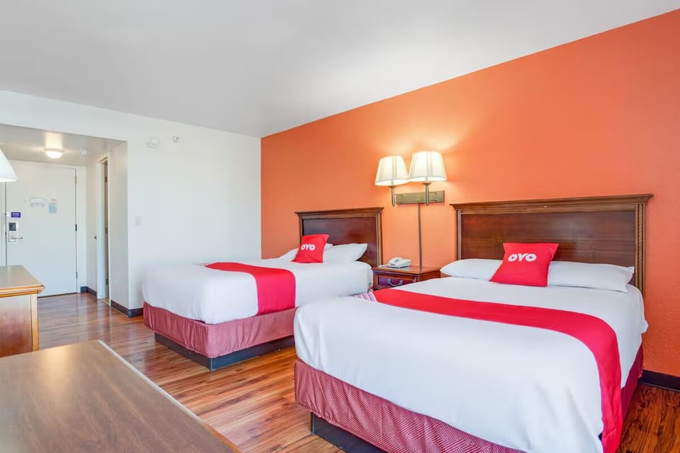 Share the space comfortably with two beds and warm lighting.