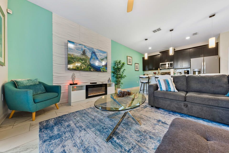 Spacious open layout where everyone can cook, dine, and unwind together after park days.