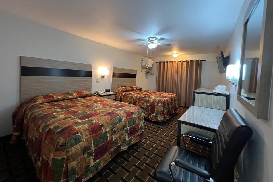 Settle in and relax in a spacious room with two beds.
