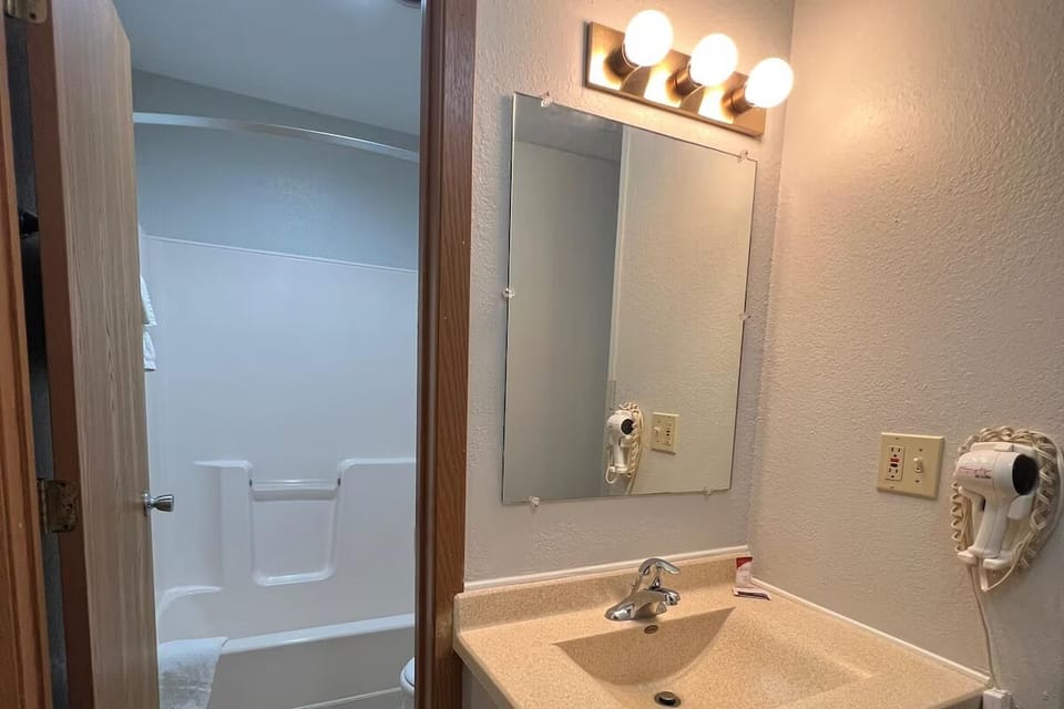 Start the day with a bright vanity and ample counter space.