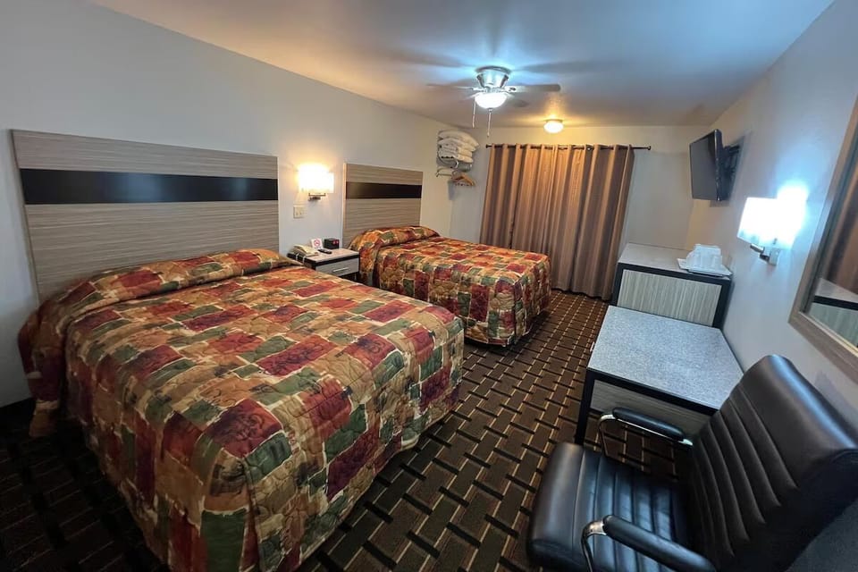 Settle in with a spacious layout, desk, and relaxing seating.