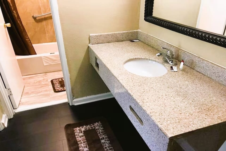 Refresh each morning with a generous vanity and bright mirror.