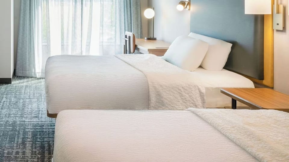 Sink into plush bedding and enjoy a calm work nook.
