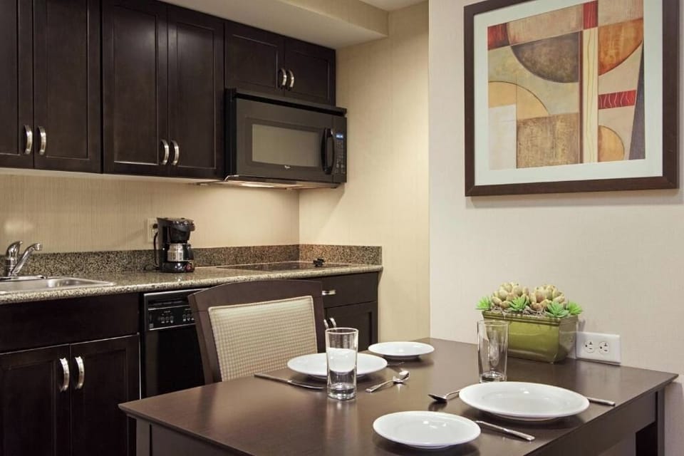 Cook easy meals in a full kitchen with modern appliances.