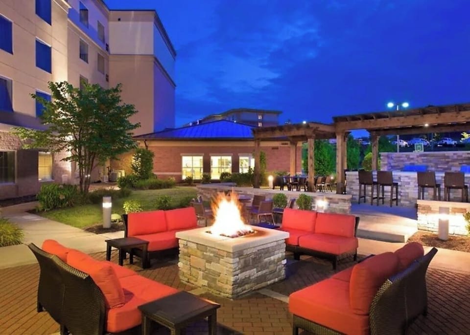 Relax outdoors at the patio tables near the courtyard.
