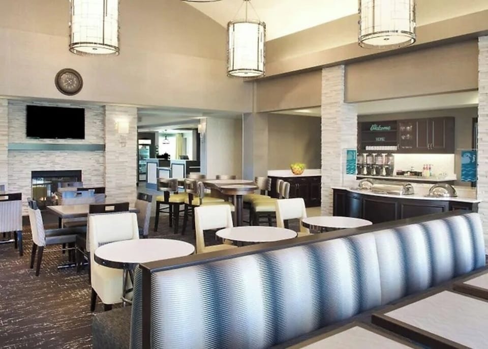 Start your morning in the stylish lounge with coffee nearby.