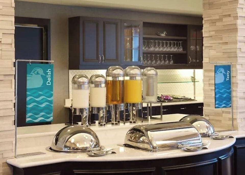 Indulge in breakfast favorites with juice, cereal, and pastries.