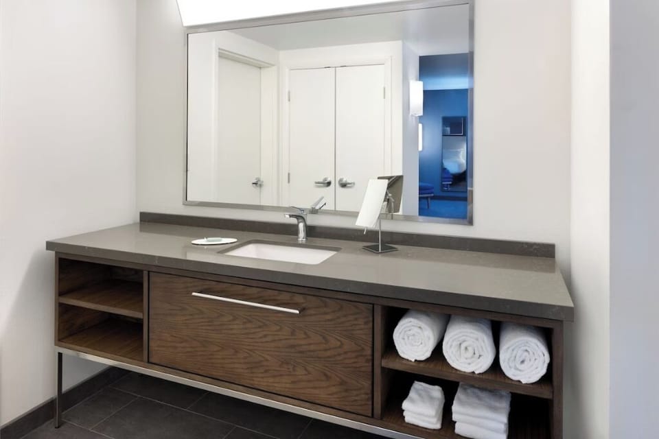 Enjoy extra counter space and neatly folded towels within reach.