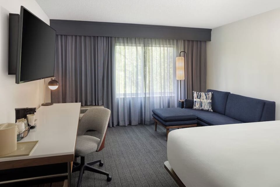 Recharge after meetings with lounge space and bright window views.
