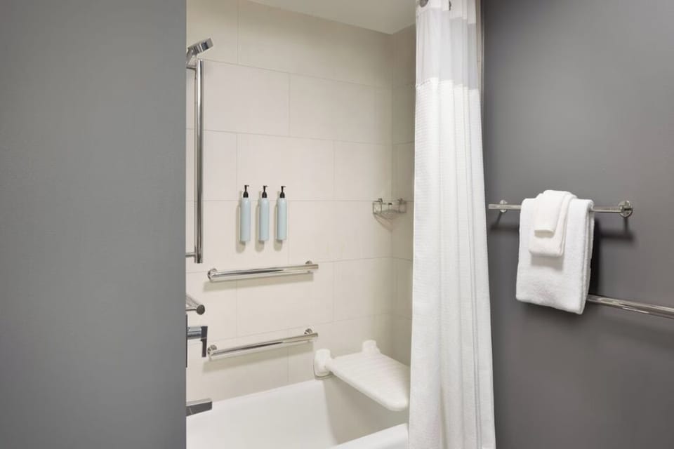 Refresh easily with accessible shower comforts and spa-like toiletries.