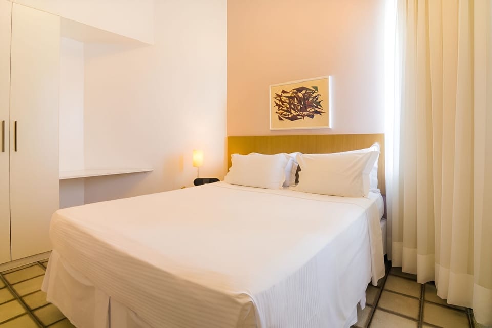 Settle in with ample storage and calming neutral tones.