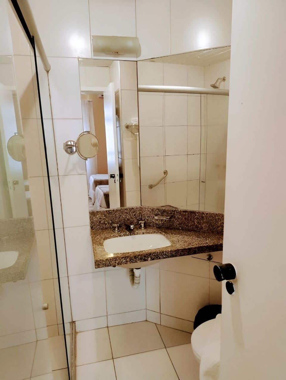 Refresh easily with a bright vanity and walk-in shower.