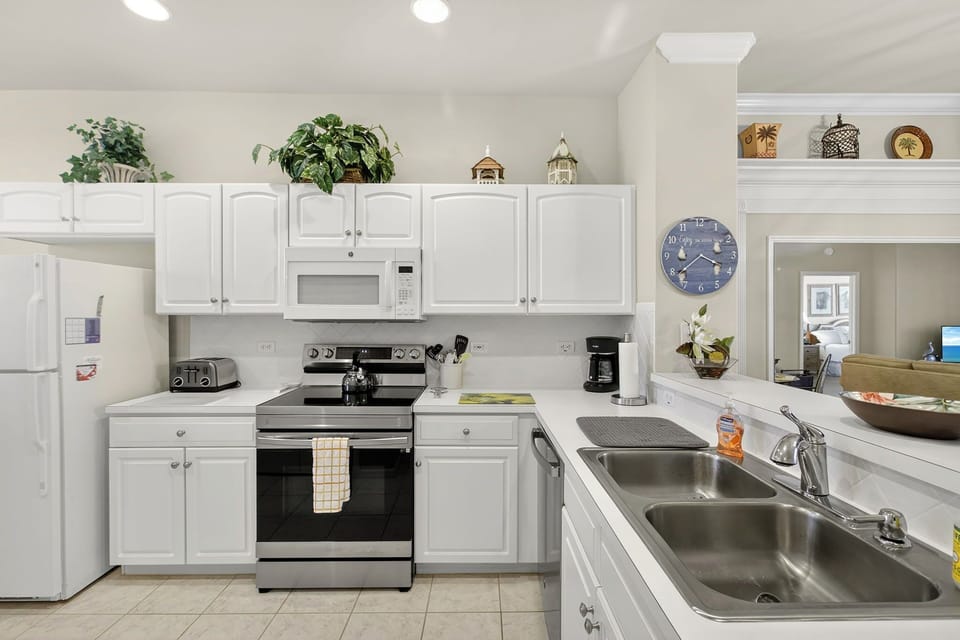 Fully equipped kitchen with modern appliances and ample counter space.