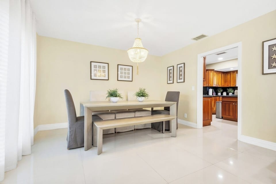 We believe in proper dining, seated at a long solid wood table with comfortable chairs. Whether you cook or like your food delivered, this dining area is a perfect space to share a meal. 