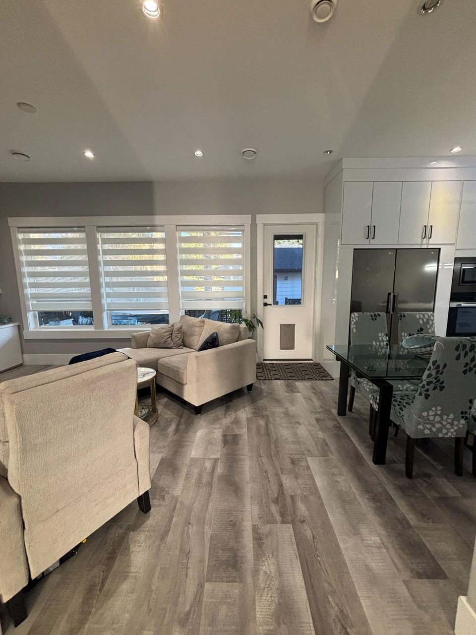 Hallway to second living room and kitchen