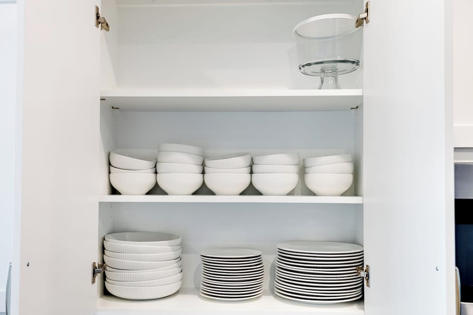 Plenty of dishware on hand for group meals and family dinners