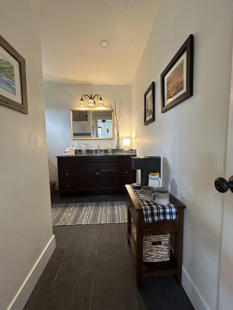Cozy entryway leading to a modern, open kitchen space