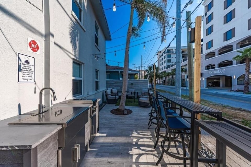 Soak up neighborhood energy from the open-air patio.
