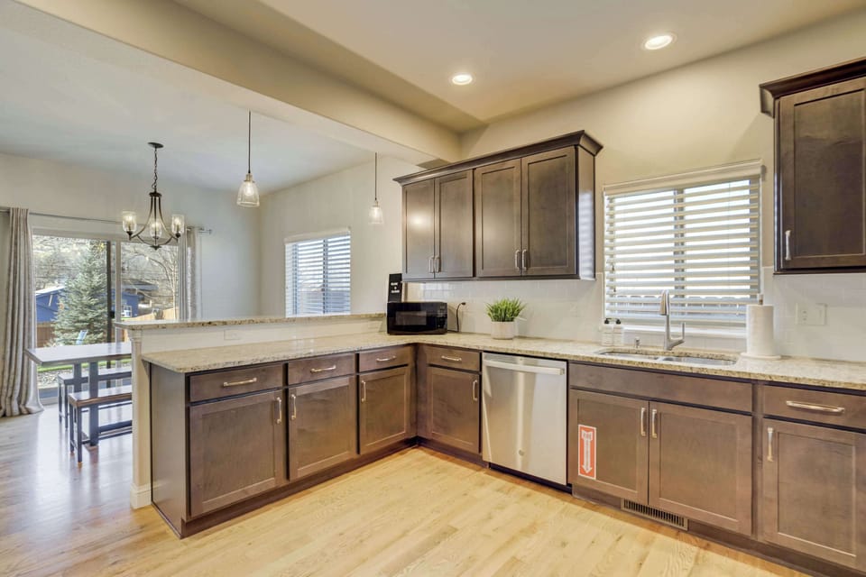 Enjoy a fully stocked kitchen with granite countertops and an open design that connects to the dining area. We provide professional-grade appliances and ample cabinet space for all your group cooking needs.