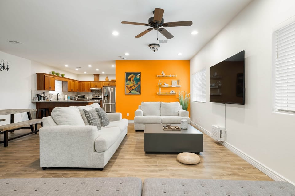 GREAT ROOM, GREATER VIBES with a 75" Roku TV glows from every corner