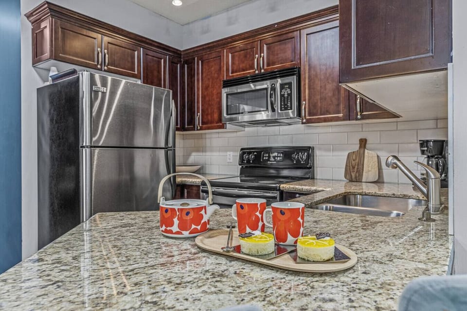 Kitchen with stainless steel appliances.