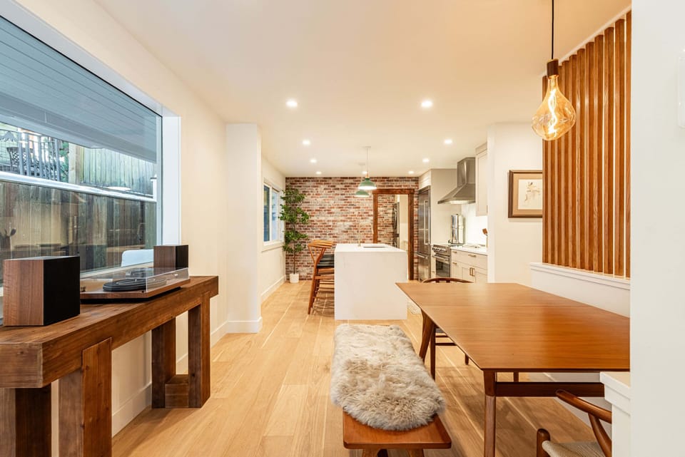 Dining area with handcrafted table and bench seating
