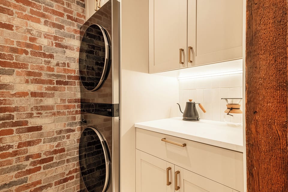 Coffee and prep station with exposed brick backdrop