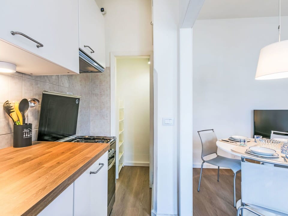Interior Design, Flooring, Kitchen, Countertop, Major Appliance, Furniture, Floor, Kitchen Appliance, Ceiling, Room