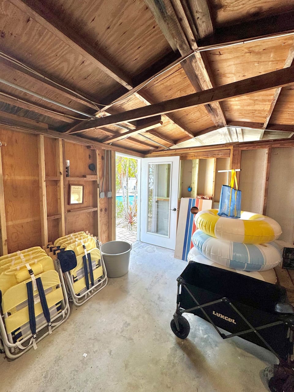 Garage with beach accessories.