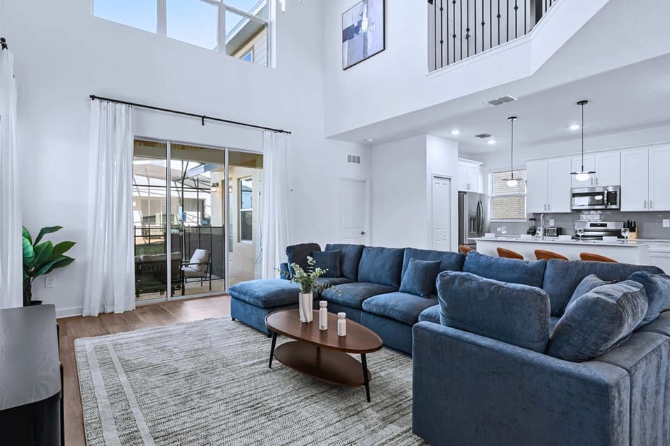 Main living room – Comfortable seating with soaring ceilings