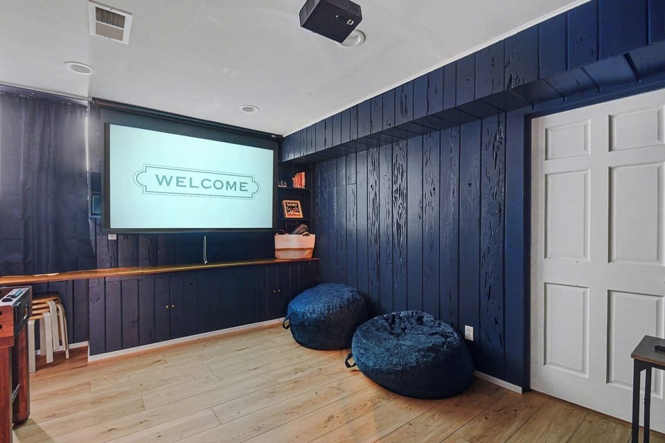 Private theater room with projector
