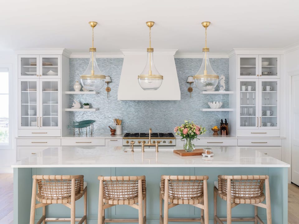 Chef’s kitchen featuring high-end appliances and refined design