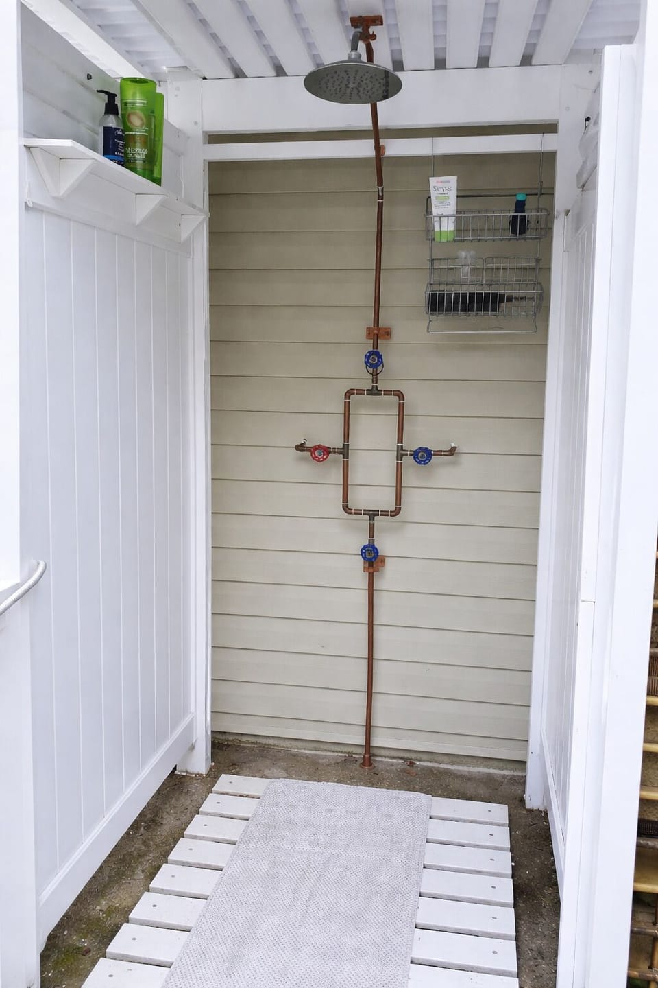 Wash off in the spacious outdoor shower after a day at the beach!