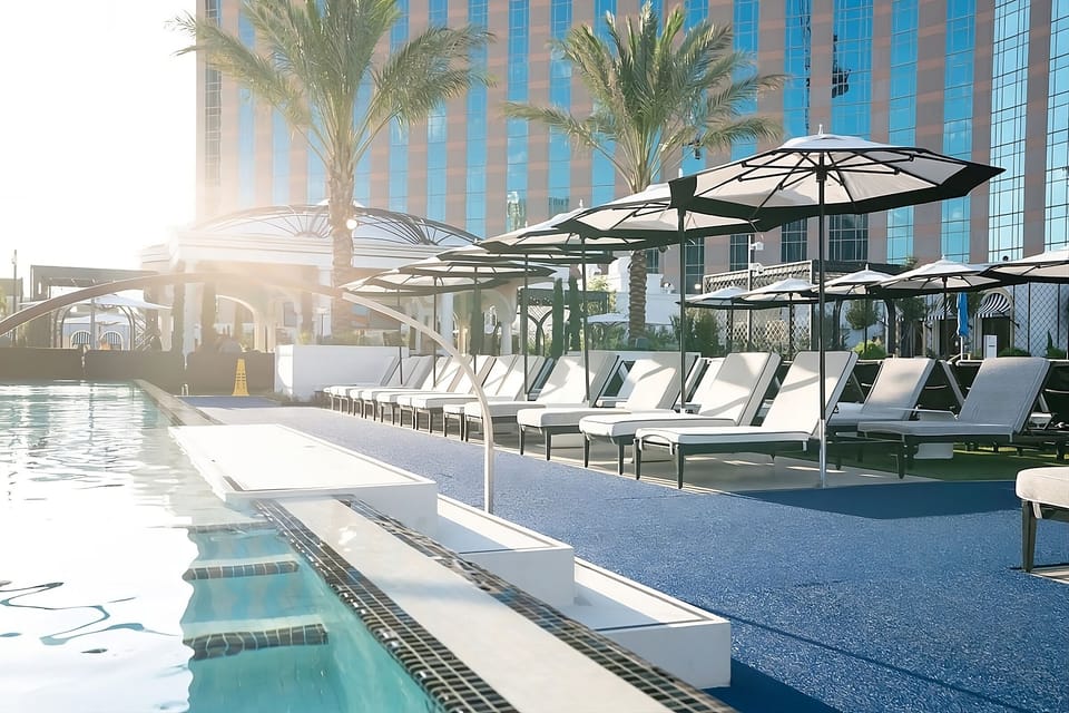 Soak up sunshine by the sparkling pool and loungers.
