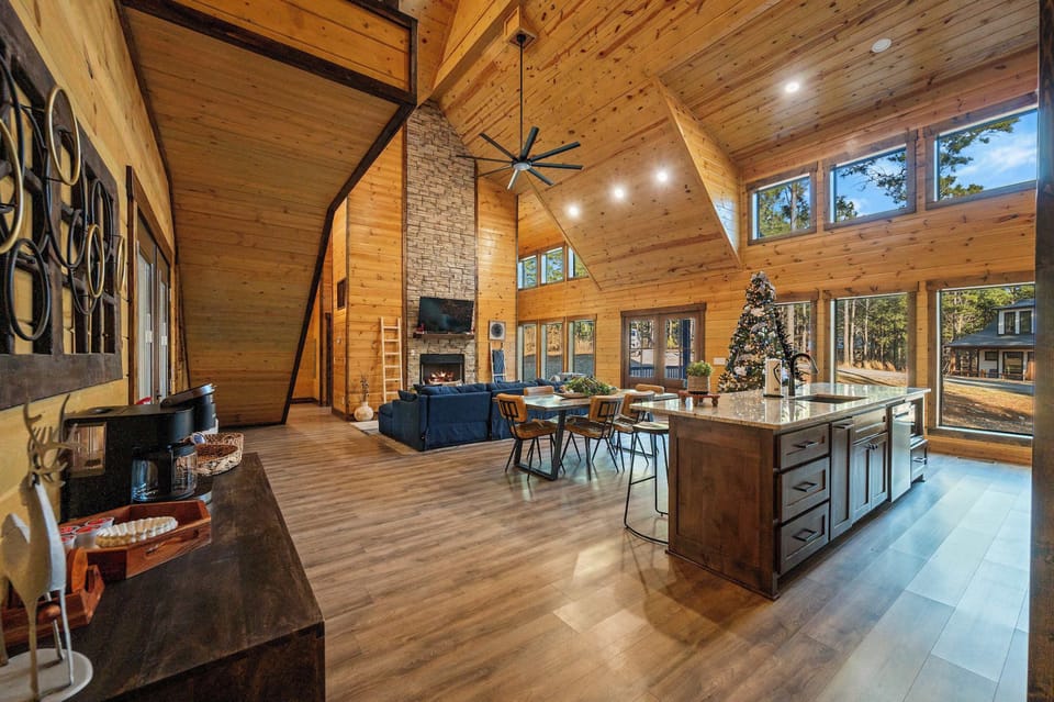Bright Open-Concept Cabin Fireplace, Kitchen & Dining Space
