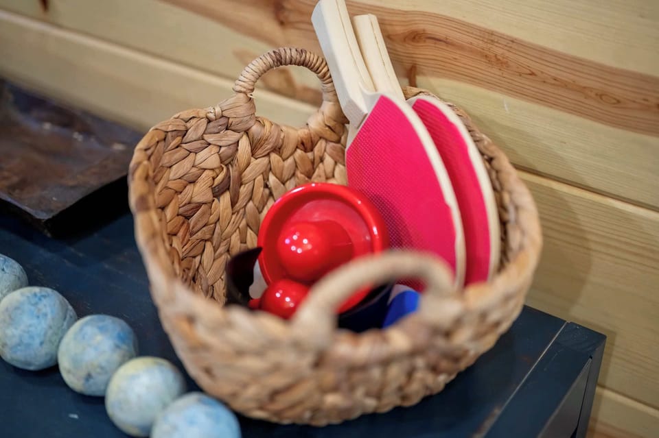 Family ping pong fun in your Broken Bow cabin getaway