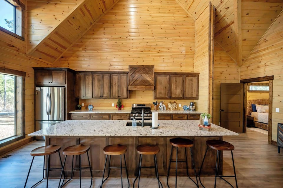 Bright Open Cabin Kitchen w/ Large Island, Bar Stools & High Ceilings