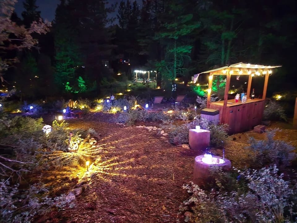 The property is lit up with solar lighting and turning turns into a whole new world as the sun goes down.  