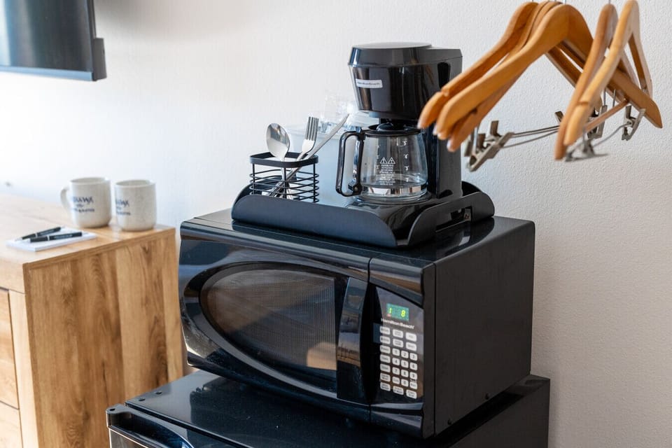 Convenient coffee maker, microwave, and essentials for an easy stay