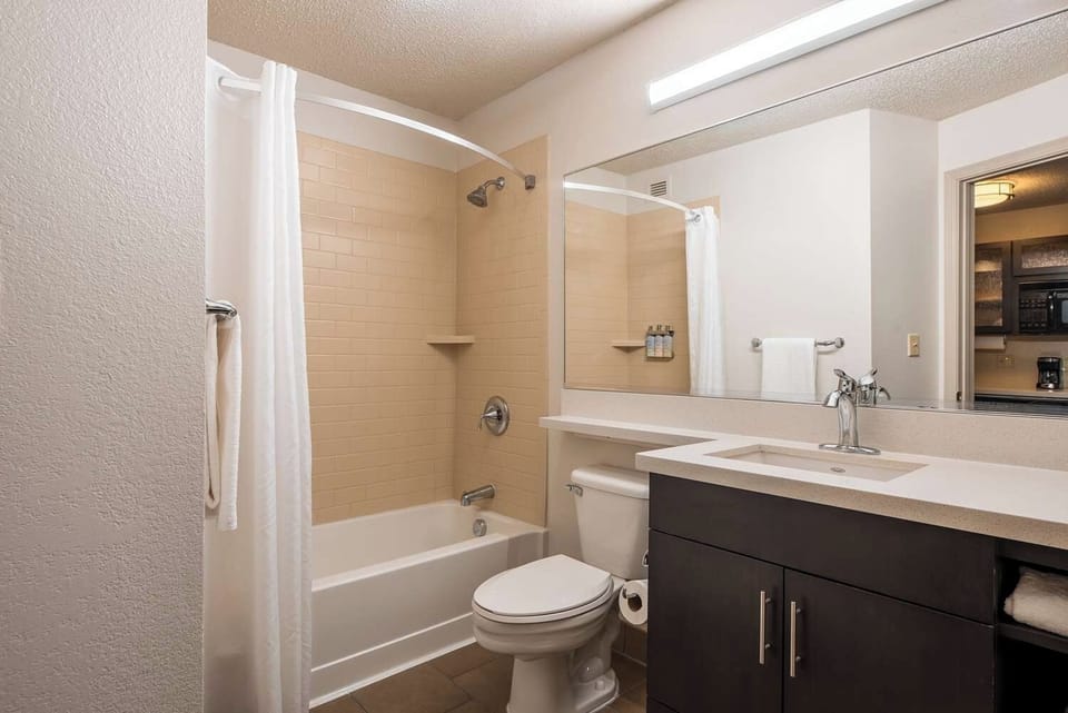 Refresh comfortably in a bright bath with tub-shower combo.