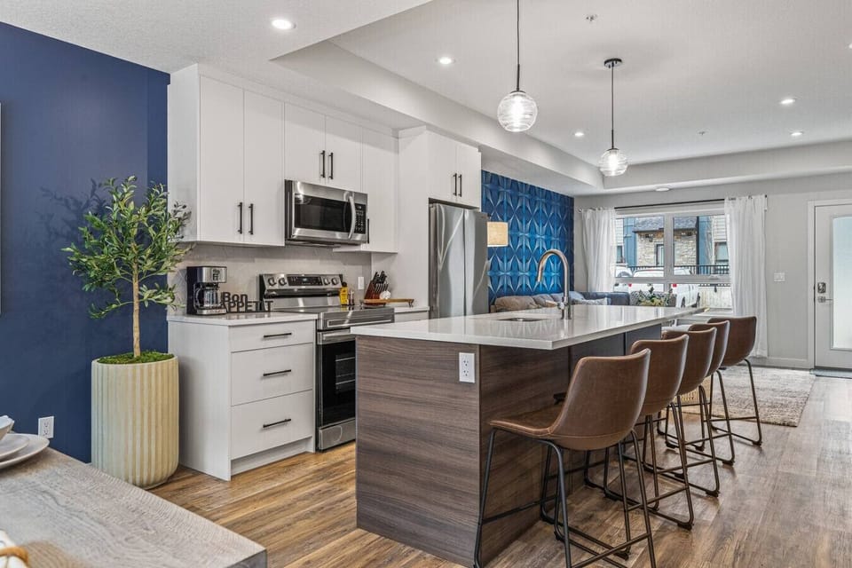 The kitchen features all the essential appliances to meet your needs. It is also stocked with basic cookware and kitchen utensils for 14 such as:Basic Plate SetWater GlassesWine Glass SetSilverware SetCoffee MugsPots & Pans