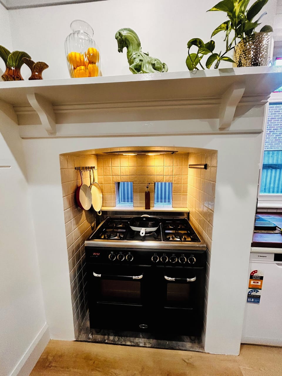 A full gas range and twin electric oven.