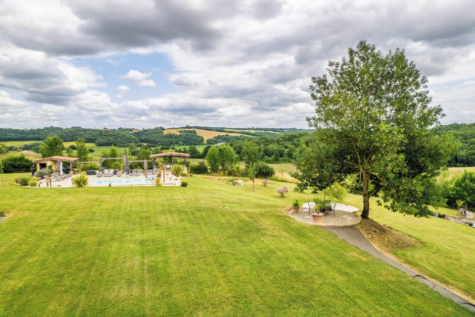 Lawn in front of pool and terraces