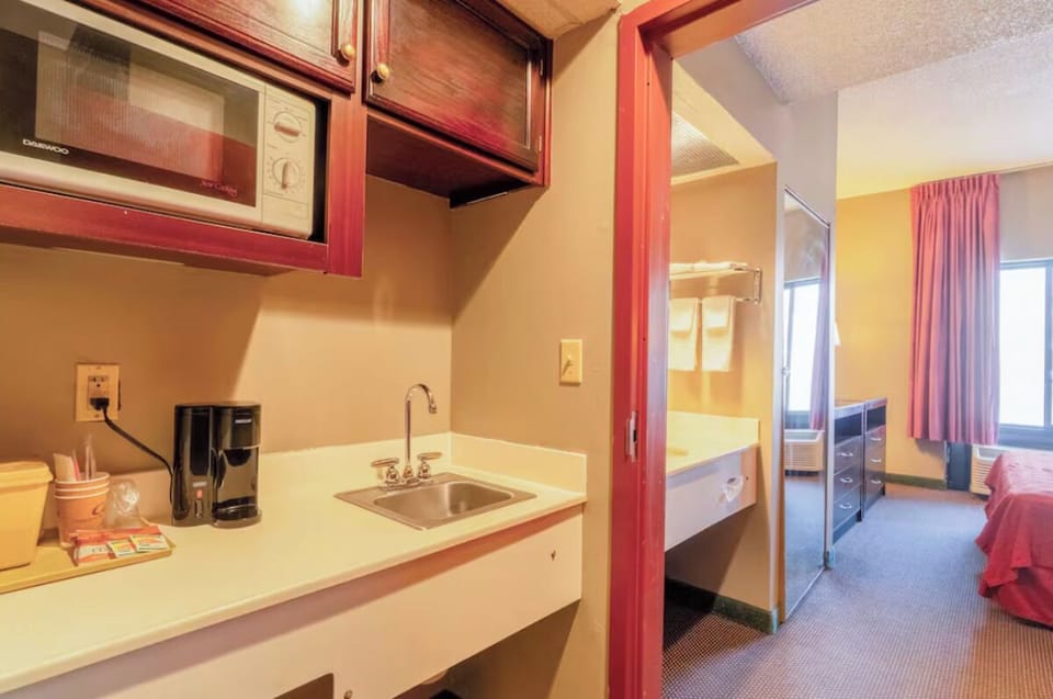 Settle in with easy meals using the in-room kitchenette