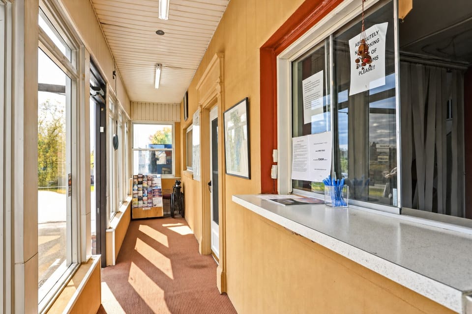 Stroll through the bright entry corridor before settling in.