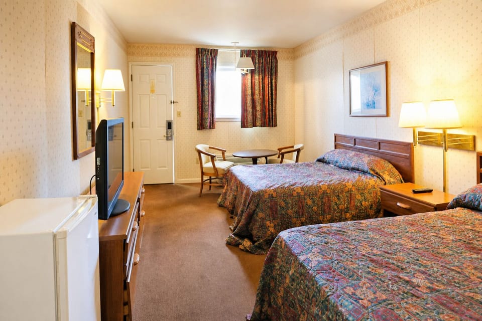 Kick back with in-room TV and handy mini fridge.