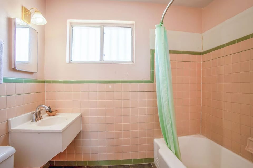 Freshen up in a bright bath with tub soak.