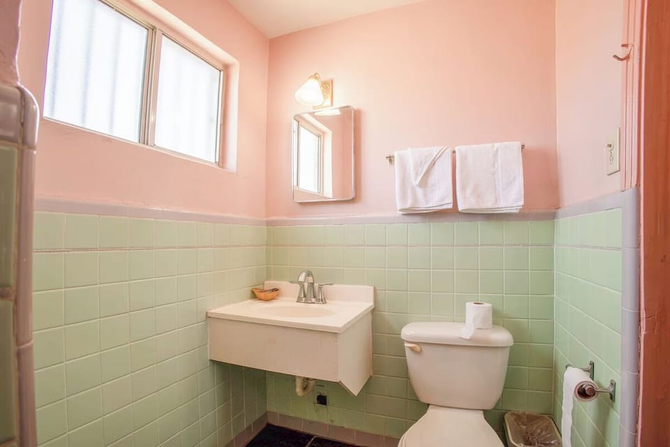 Refresh easily with a bright vanity and fluffy towels.